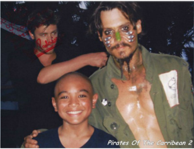 Neil Panlasigui, Johnny Depp on set of Pirates of the Caribbean